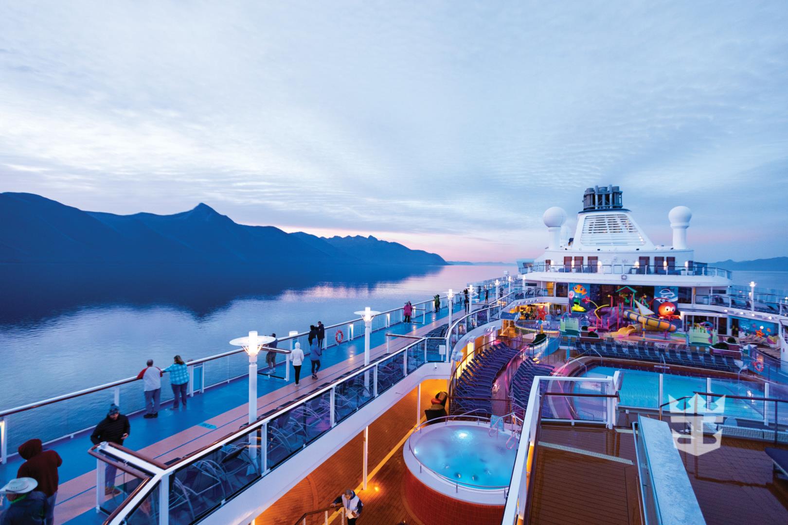 Aerial view of passengers on pool deck at sunset - Photo Credit: N Morley